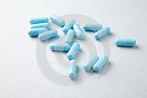 Calcium capsules. Bright background. Top view. photo