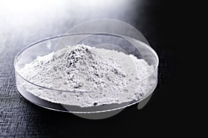 Calcium carbonate  the result of the reaction of calcium oxide with carbon dioxide. Being prepared in petri dish