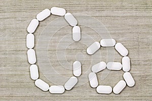 Calcium carbonate tablets in a symbol shape of Ca alphabet photo