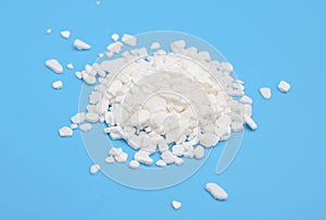 Calcium chloride on blue background