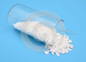 Calcium chloride on blue background