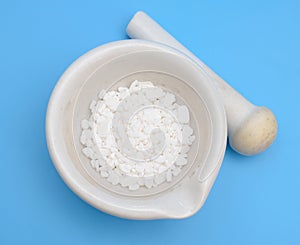 Calcium chloride on blue background