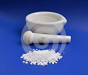 Calcium chloride on blue background