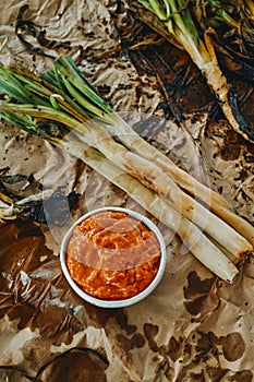 calcots typical of Catalonia, Spain, and romesco sauce