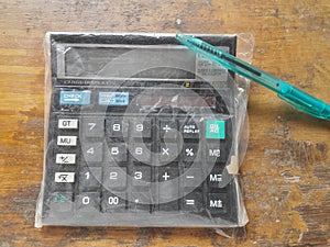 It is a calculater and a pen