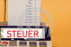 Calculating machine isolated on a neutral background