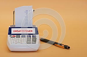 Calculating machine isolated on a neutral background