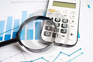 Calculator on chart graph paper. Finance, account, statistic, investment data economy, stock exchange business