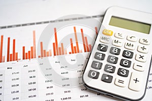 Calculator on chart graph paper. Finance, account, statistic, investment data economy, stock exchange business