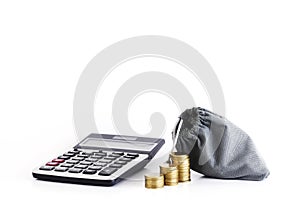 Calculator and coins with money bag for loans concept