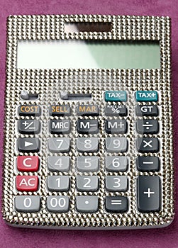Calculator covered with swarovski crystals