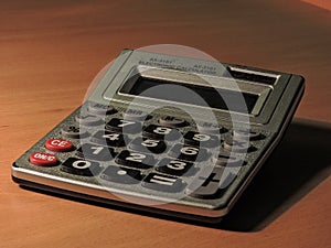 Calculator on the desk.