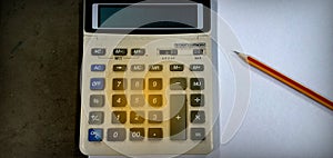 Calculator on the desk photo