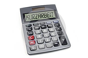 Calculator with the german word for short time work - Kurzarbeit isolated