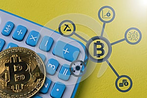 Calculator. golden bitcoin and bitcoin trading symbols. Bitcoin technology financial concept