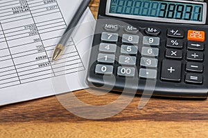 Calculator And Pen and Finance Document