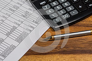 Calculator And Pen and Finance Document