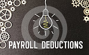 Calculator,pencil and banknotes with the word Payroll Deduction on world map background.