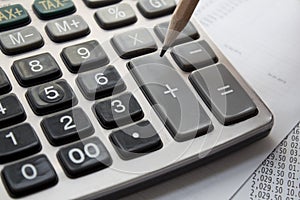 Calculator and pencil.