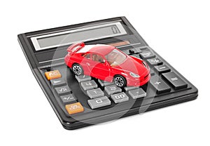 Calculator and red toy car