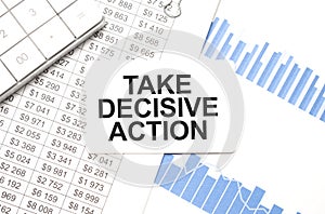 calculator,reports and card with text TAKE DECISIVE ACTION