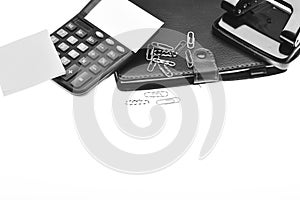 Calculator and stationery with copy space, close up