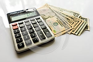 Close-up Money and Calculator, American Dollar Banknotes