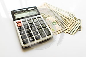 Close-up Money and Calculator, American Dollar Banknotes