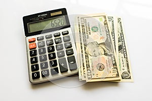 Close-up Money and Calculator, American Dollar Banknotes