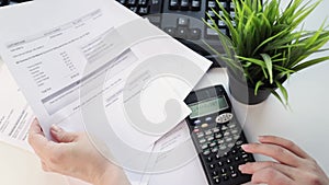 Calculator and utility bill, Paper bill with energy and water charges