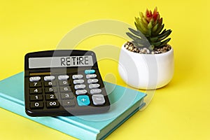 Calculator with the word RETIRE on the display.
