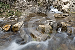 Calderones del Infierno canyon landscape in the north of Spain with silky water effect