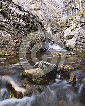 Calderones del Infierno canyon landscape in the north of Spain with silky water effect