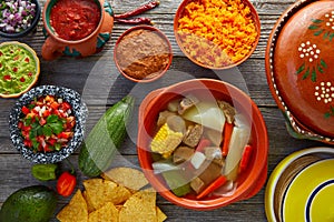 Caldo de res Mexican beef broth in table