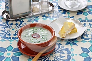 Caldo verde kale soup  &  broa corn bread photo