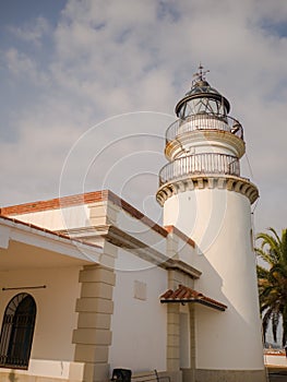 Calella Lighthouse is active lighthouse situated in coastal town of Calella in Costa del Maresme, Catalonia, Spain photo