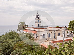 Calella Lighthouse is active lighthouse situated in coastal town of Calella in Costa del Maresme, Catalonia, Spain photo