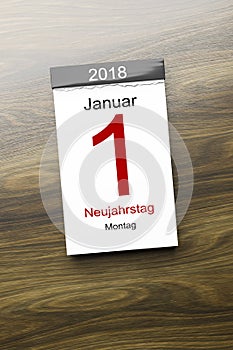 a calendar the 1st of January new year day text in german language