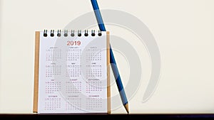 Calendar of 2019 with pencil on table. Planing work to be success