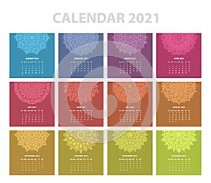 Calendar for 2021 year. Vintage decorative mandala elements. Week starts on sunday. Vintage style template for your design