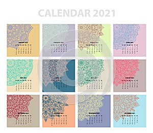 Calendar for 2021 year. Vintage decorative mandala elements. Week starts on sunday. Vintage style template for your design