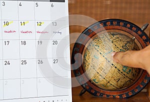 Calendar with antique globe