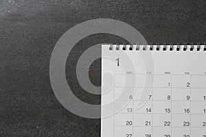 calendar on the black table background, planning for business meeting or travel planning concept