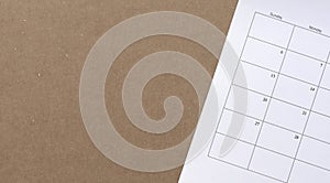 Calendar on brown cardboard paper, copy space