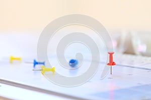Calendar, Close-up red pin on blank desk calendar with office equipment concept of event planner or personal organization for