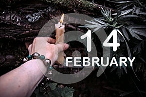 calendar date on the background of an esoteric spiritual ritual. February 14 is the fourteenth day of the month