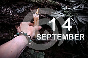 calendar date on the background of an esoteric spiritual ritual. September 14 is the fourteenth day of the month