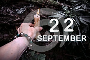 calendar date on the background of an esoteric spiritual ritual. September 22 is the twenty-second day of the month