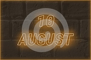 Calendar date on the background of an old brick wall. 10 august written glowing font. The concept of an important date or holiday