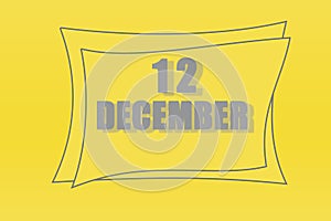 Calendar date in a frame on a refreshing yellow background in absolutely gray color. december 12 is the twelfth day of the month